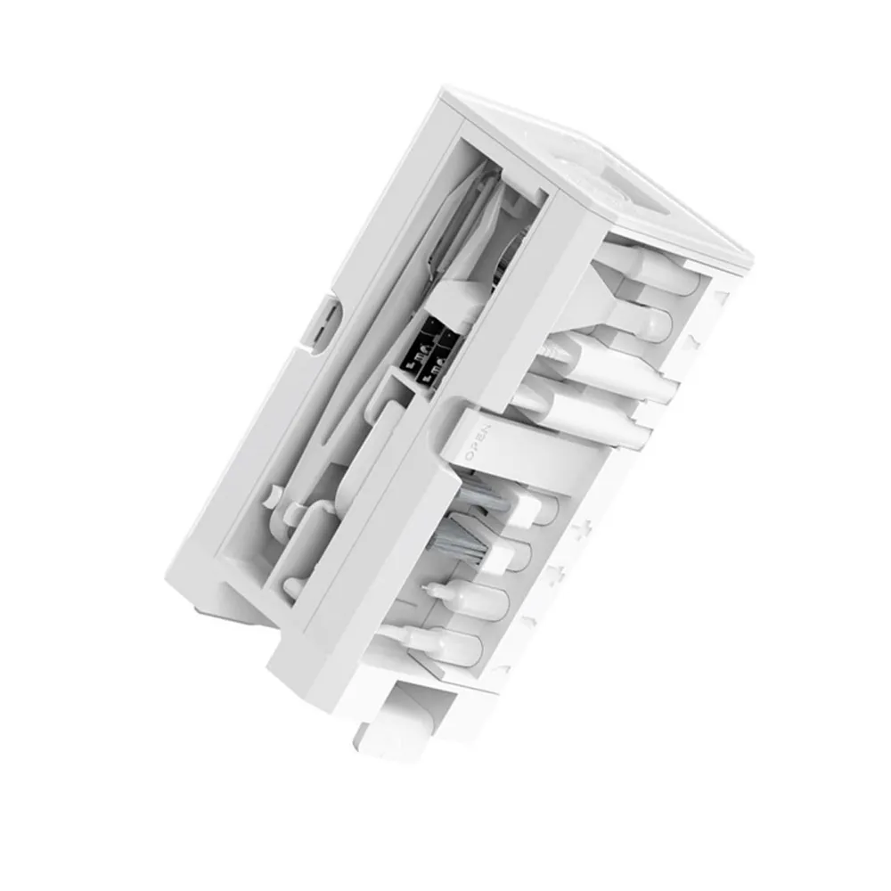 32-in-1 multifunctional electronics cleaning kit displayed with a DSLR camera and keyboard