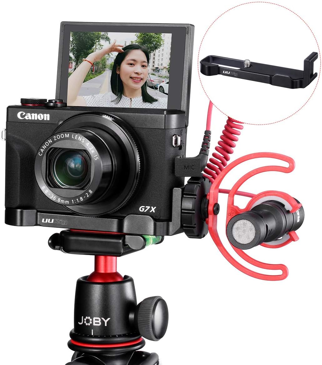 canon powershot g7x mark iii mounted on a small vlogging tripod with an external microphone plugged into the 3.5mm port on the side